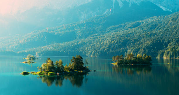 istock Fantastic sunrise on mountain lake Eibsee 918128754