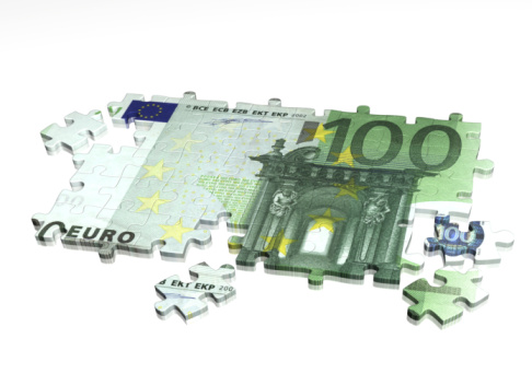 Collected puzzle with the image of euro