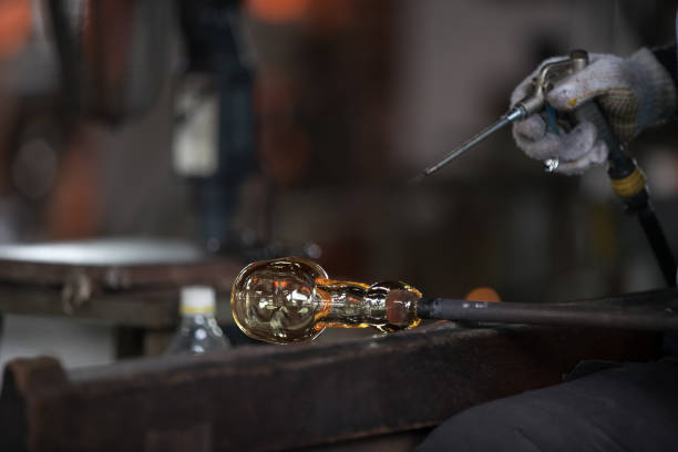 istock Molten glass on a metal rod 918132268