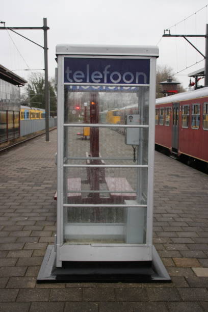 istock historical telephone box in station platform in Netherlands 918132474