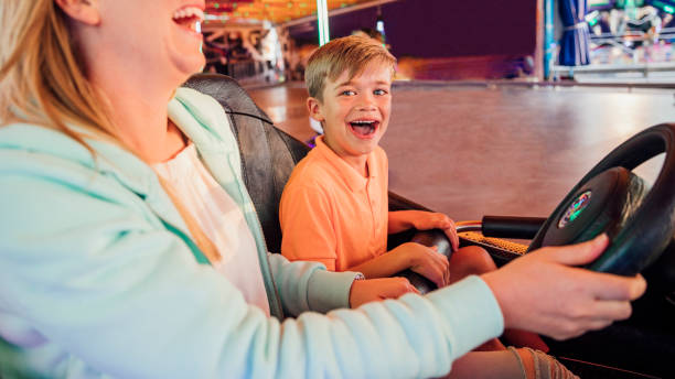 istock Mother and Son Having Fun on the Dodgems 918136064
