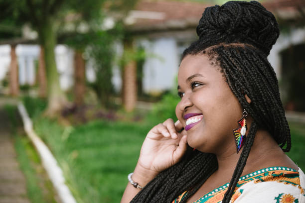 istock Afro young woman headshot 918136084