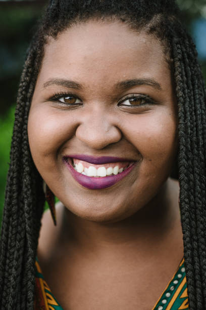 istock Afro young woman headshot 918136090
