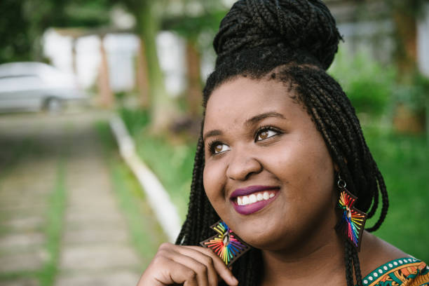 istock Afro young woman headshot 918136102