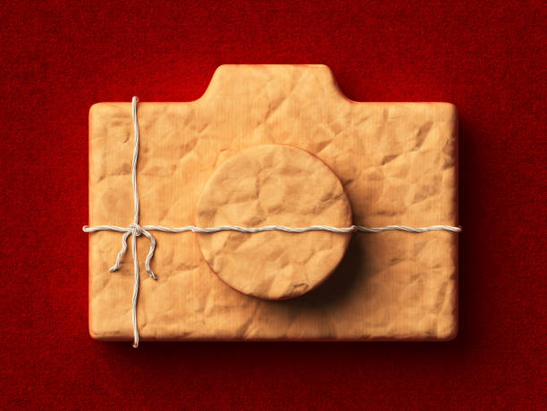 istock Photograph camera wrapped in kraft paper 918139136