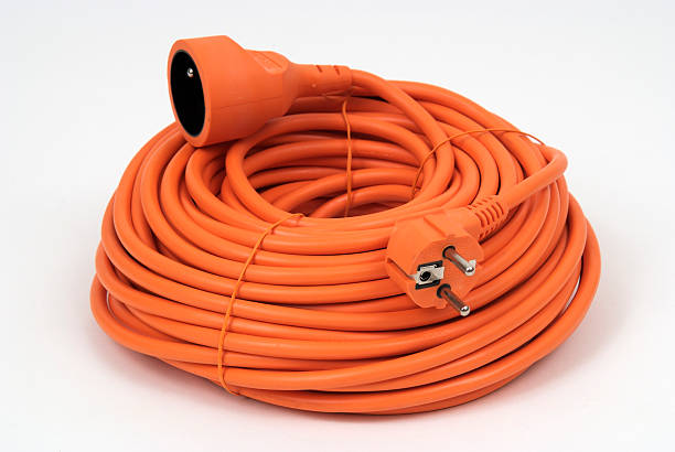 Coiled Extension Cord  two pin plug stock pictures, royalty-free photos & images