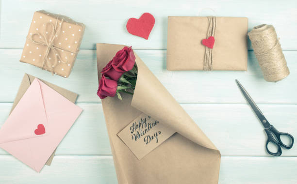 istock Valentine day theme. Top view of workplace for preparing handmade decorations. 918143400