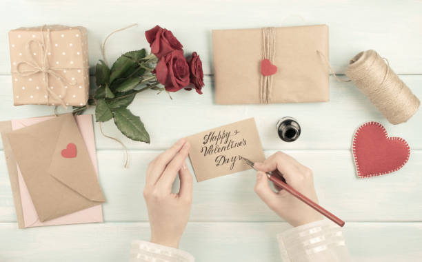 istock Valentine day theme. Top view of workplace for preparing handmade decorations. 918143452