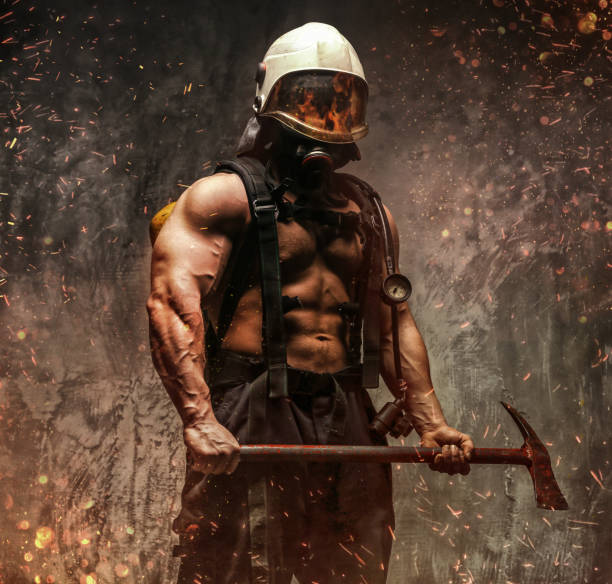 istock Fireman in fire sparks and smoke. 918145846