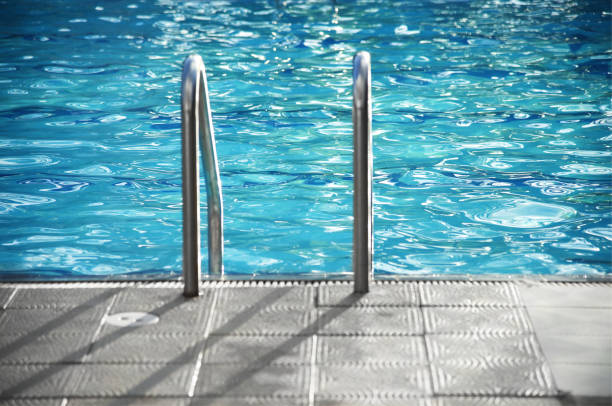 istock Swimming pool with stair : out of focus 918145848
