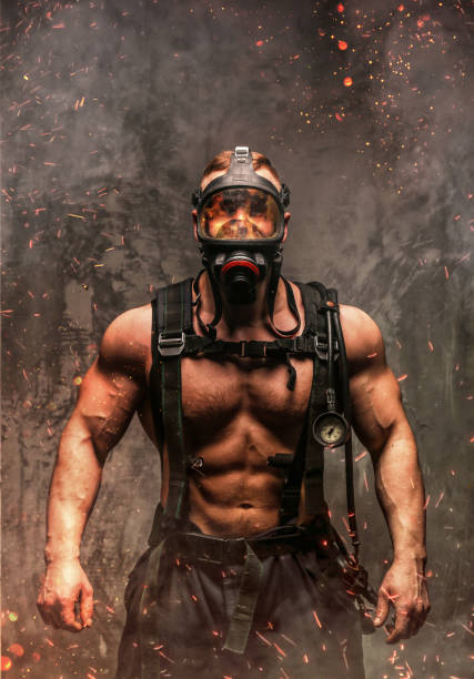 istock Fireman in fire sparks and smoke. 918146248