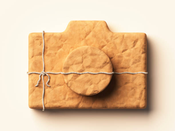 istock Photograph camera wrapped in kraft paper 918146702