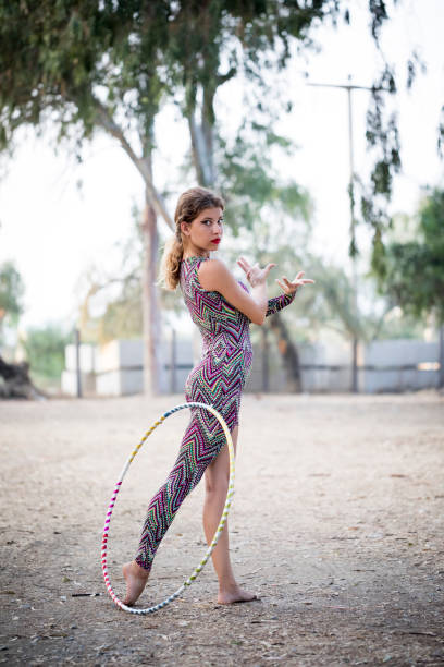istock Woman with hula hoop 918146892