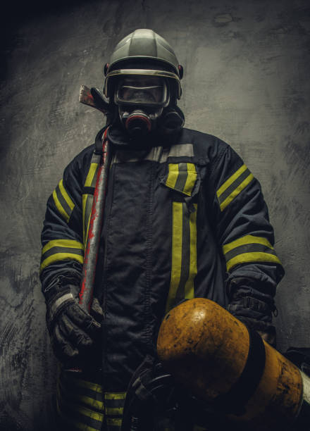istock Portrait of firefighter in safety uniform. 918149584