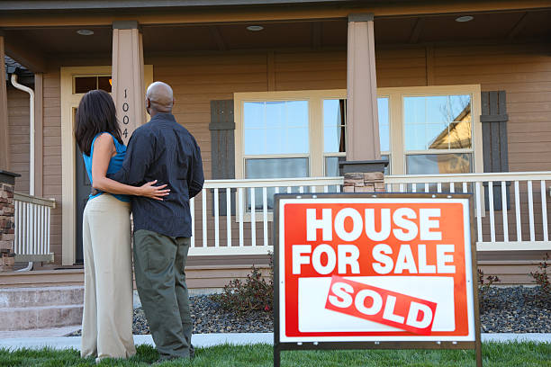 istock Couple looking at new home together 91814979