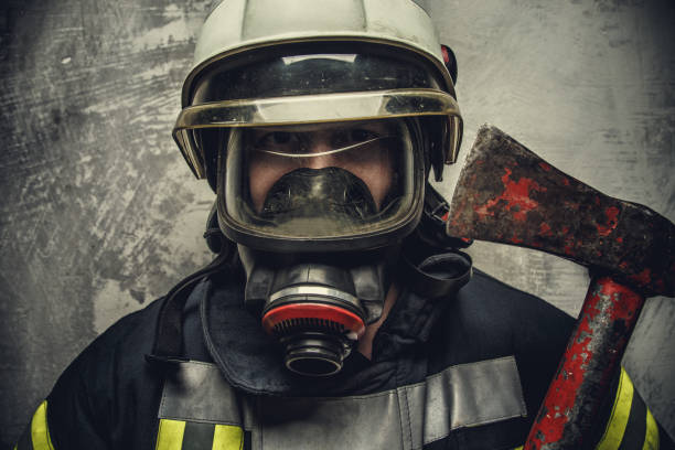 istock Portrait of firefighter in oxygen mask. 918149794