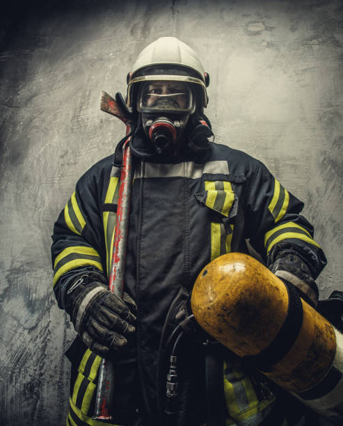 istock Portrait of firefighter in safety uniform. 918153798