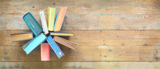 Arrangement of old books, flat lay, free copy space