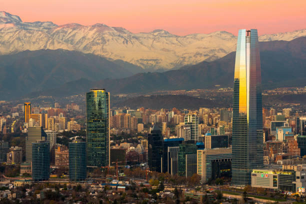 Skyline of modern buildings at financial district Santiago, Region Metropolitana, Chile - June 01, 2013: Skyline of modern buildings at financial district with The Andes mountain range in the back. sanhattan stock pictures, royalty-free photos & images