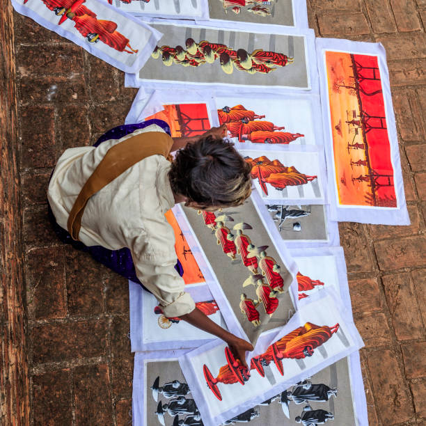 istock Young Burmese boy selling sand paintings in Bagan, Myanmar 918162090
