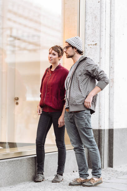 istock hipster couple walking together in berlin 918162778