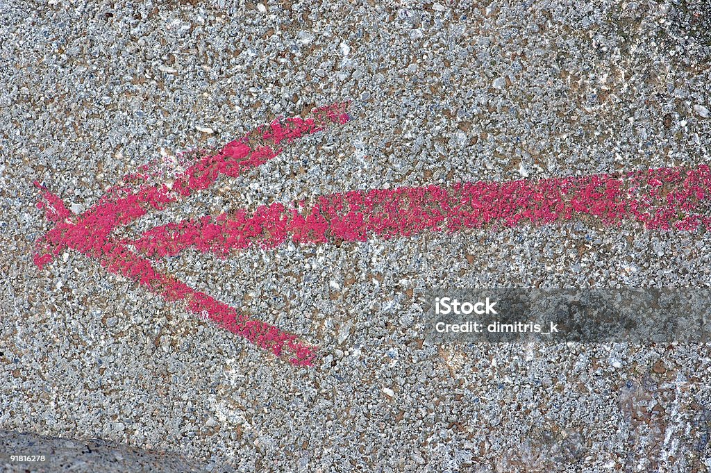 arrow sign on stone  Abstract Stock Photo