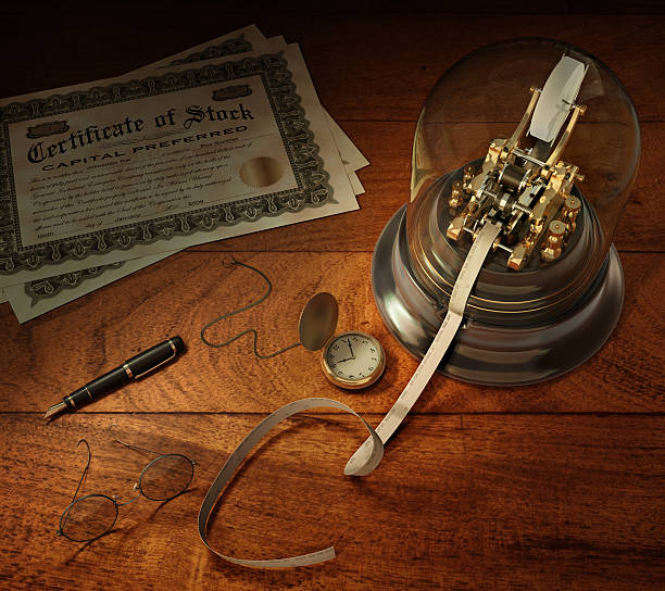 Stock brokerage elements on wood table Vintage stock brokerage desk with ticker tape machine, FAKE shares of stock, fountain pen and pocket watch   ticker tape machine stock pictures, royalty-free photos & images