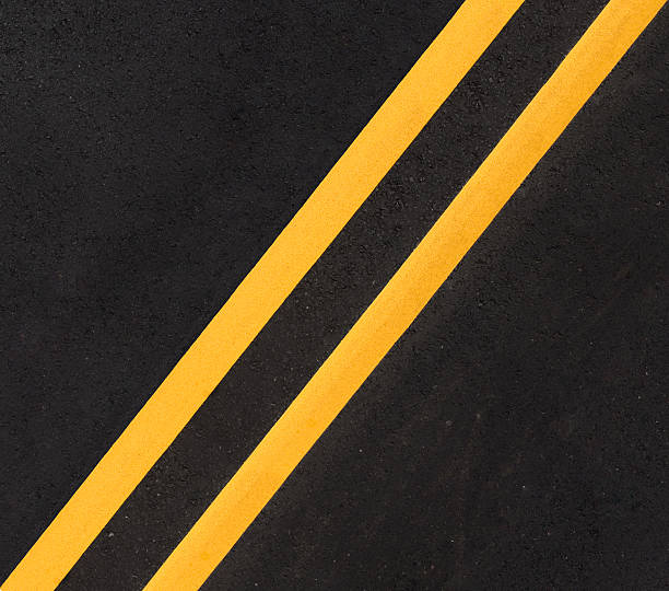 istock Diagonal Center Lines On Road 91817119