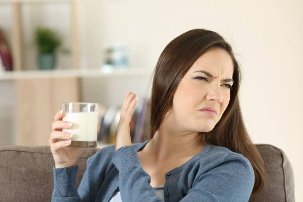 istock Woman refusing a glass of milk 918171450