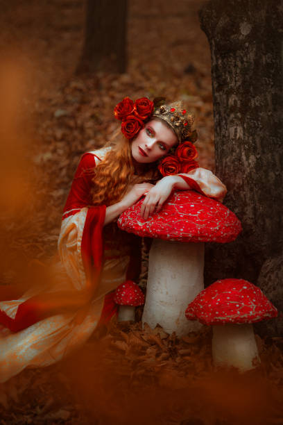 istock Woman in red medieval dress 918172562