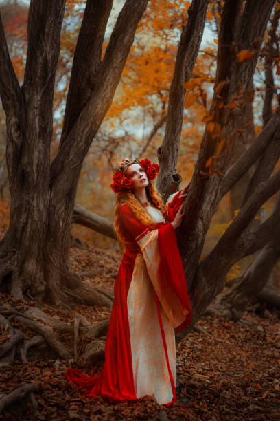 istock Woman in red medieval dress 918176668