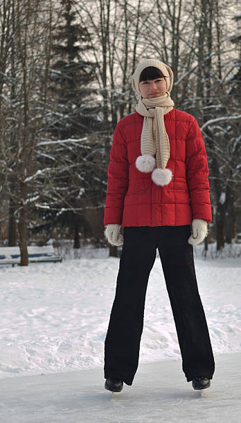 Girl skating on ice stock photo