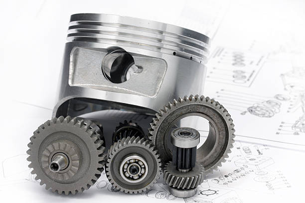 A prototype containing cogs and its blueprint stock photo