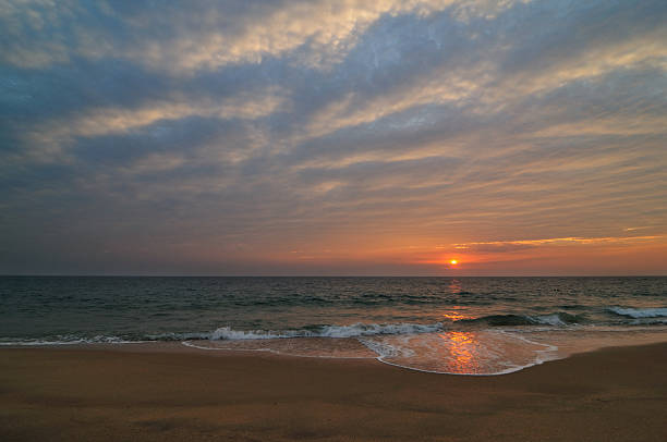 istock Sun setting in the Arabian Sea 91819050