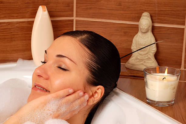 istock woman relaxing in bath 91819162