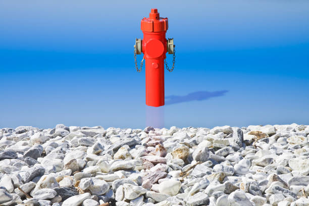 An improbable hydrant at the seaside. Plenty of water concept image