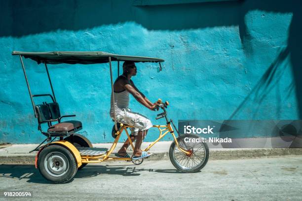 Bicycle Taxi Driver With His Vehicle Cuba Stock Photo - Download Image Now - Cuba, Santiago de Cuba, Bicycle