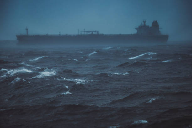 istock Cargo boat sailing in a rough sea 918204644