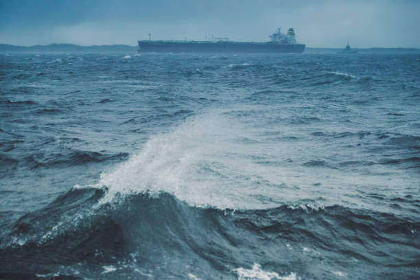 istock Cargo boat sailing in a rough sea 918204790