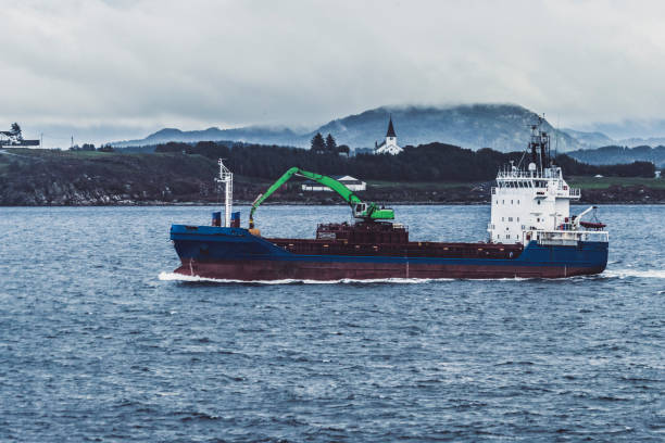 istock Cargo boat sailing in a fjord 918204802