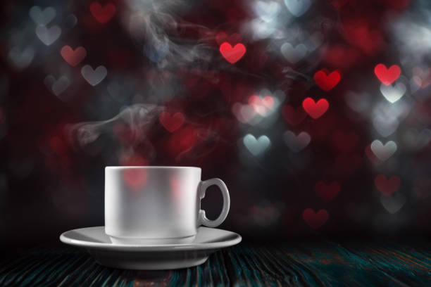 istock Coffee cup with steam over heart shaped background 918205210