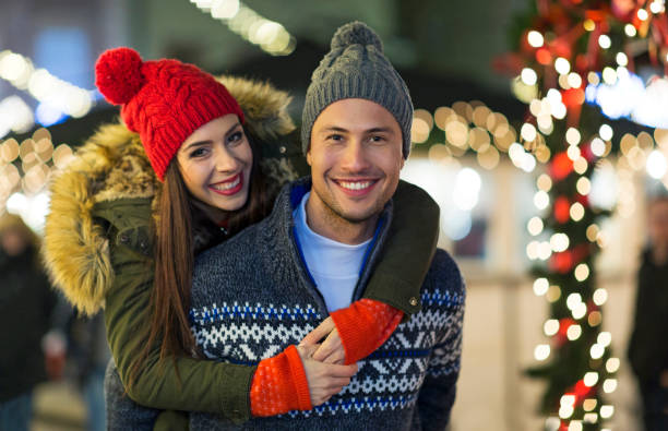istock Young Couple Having Fun Outdoors At Christmas Time 918205874