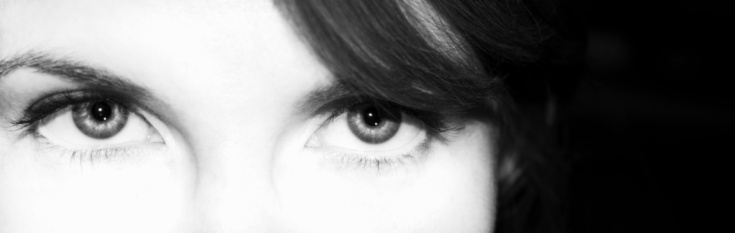 Black and white photo of a woman's eyes and nose