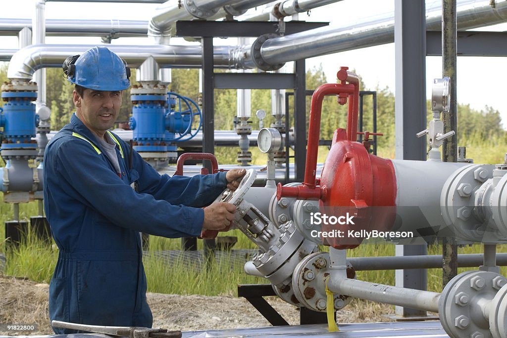 Operatore di produzione di Gas - Foto stock royalty-free di Petrolio