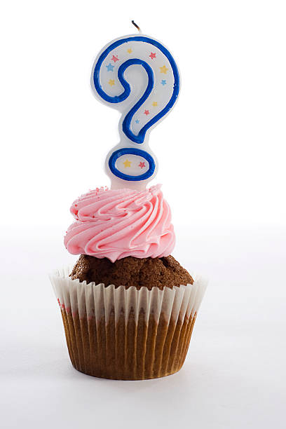 Questioning cupcake stock photo