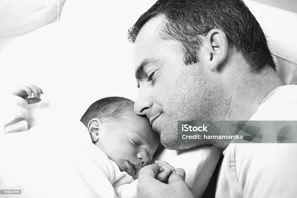 father holding his newborn baby  0-11 Months Stock Photo