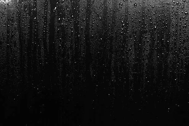 Photo of Water Droplets form on Black Metal surface