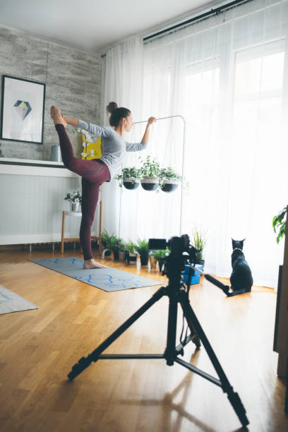 istock Young Woman Practicing Yoga 918233974