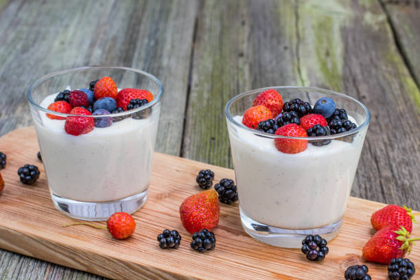 istock Homemade vanilla pudding with raspberries and blackberries and blueberries 918236454