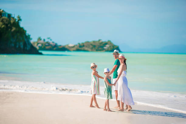 istock Happy beautiful family on the beach 918237442